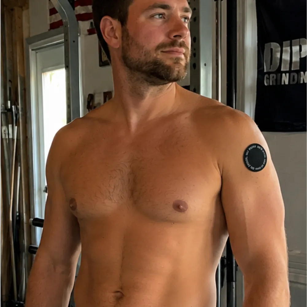 A customer wearing the patch on his upper arm